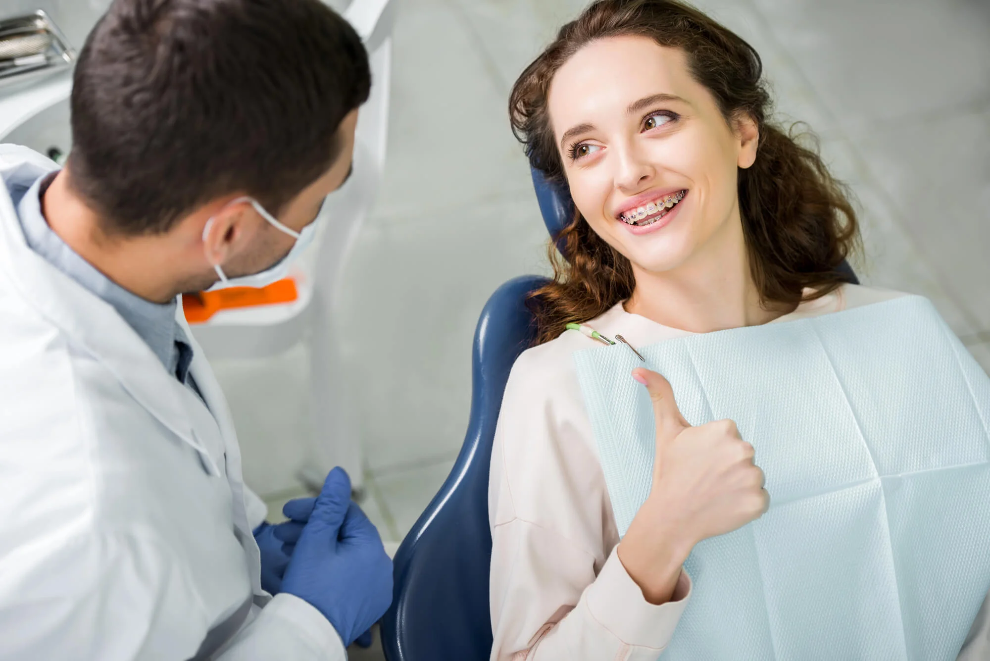 Happy patient with orthodontist in Fleming Island, FL